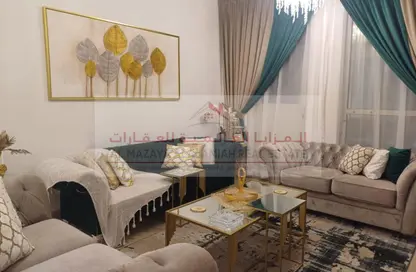 شقة - 2 غرف نوم - 2 حمامات للايجار في برج منازل 2 - شارع التعاون - التعاون - الشارقة