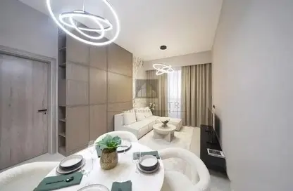 Living / Dining Room image for: Apartment - 2 Bedrooms - 2 Bathrooms for sale in Amal Tower - Dubai Sports City - Dubai, Image 1