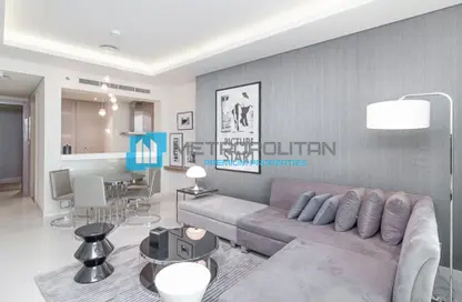 Living / Dining Room image for: Apartment - 1 Bedroom - 2 Bathrooms for sale in Tower B - DAMAC Towers by Paramount - Business Bay - Dubai, Image 1