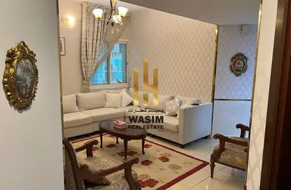 شقة - غرفة نوم - 2 حمامات للايجار في أورينت تاور 1 - أورينت تاور - البستان - عجمان