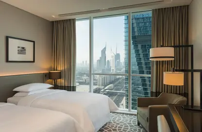 صورة لـ غرفة- غرفة النوم شقة - 2 غرف نوم - 3 حمامات للايجار في فندق شيراتون الكبير - شارع الشيخ زايد - دبي ، صورة رقم 1