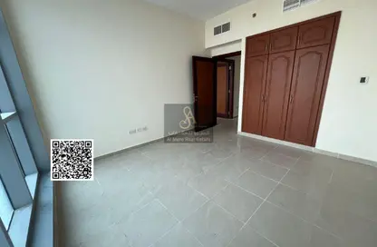 Apartment - 2 Bedrooms - 3 Bathrooms for sale in Corniche Tower - Ajman Corniche Road - Ajman