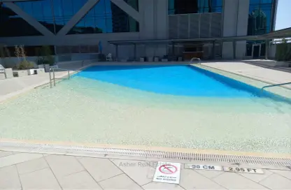 صورة لـ حوض سباحة شقة - 3 غرف نوم - 3 حمامات للايجار في برج تماني - الخليج التجاري - دبي ، صورة رقم 1