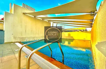 صورة لـ حوض سباحة شقة - غرفة نوم - 2 حمامات للايجار في P و 2278 - مدينة خليفة - أبوظبي ، صورة رقم 1