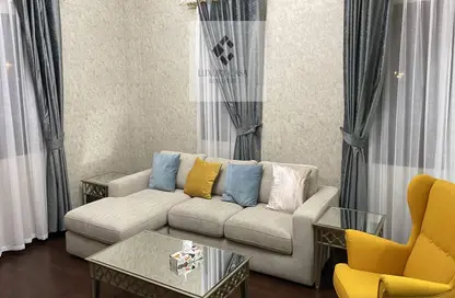 صورة لـ غرفة المعيشة شقة - غرفة نوم - 1 حمام للايجار في مدينة المهرجانات بدبي - دبي ، صورة رقم 1