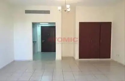 Empty Room image for: Apartment - 1 Bathroom for rent in Greece Cluster - International City - Dubai, Image 1