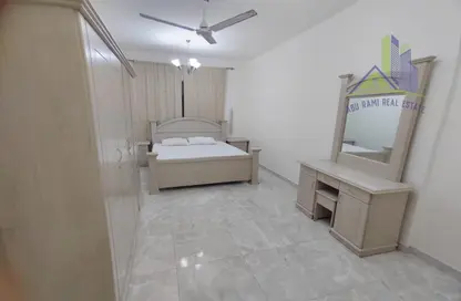 Room / Bedroom image for: Apartment - 1 Bedroom - 2 Bathrooms for rent in Al Rawda 3 Villas - Al Rawda 3 - Al Rawda - Ajman, Image 1