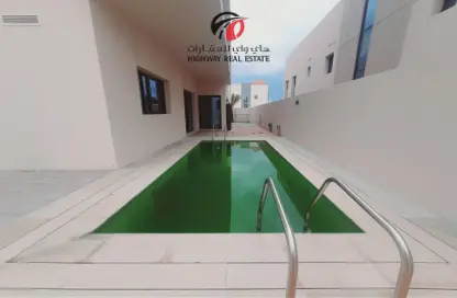 Villa - 4 Bedrooms - 6 Bathrooms for rent in Al Garhoud - Dubai