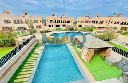 Pool image for: Townhouse - 4 Bedrooms - 3 Bathrooms for sale in The Townhouses at Al Hamra Village - Al Hamra Village - Ras Al Khaimah, Image 1