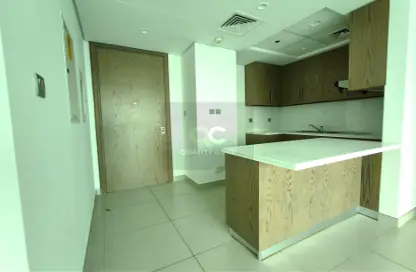 صورة لـ مطبخ شقة - 2 غرف نوم - 3 حمامات للبيع في مونتروس A - جنوب البرشاء - البرشاء - دبي ، صورة رقم 1