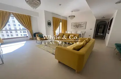 Living Room image for: Apartment - 2 Bedrooms - 3 Bathrooms for rent in Shams 4 - Shams - Jumeirah Beach Residence - Dubai, Image 1