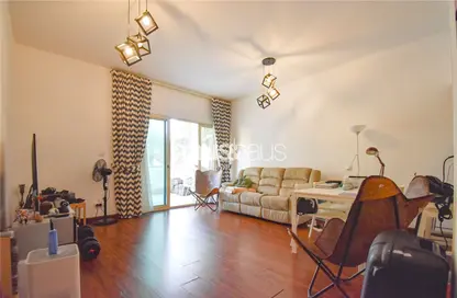 Living Room image for: Apartment - 1 Bedroom - 1 Bathroom for sale in Al Thayyal 3 - Al Thayyal - Greens - Dubai, Image 1