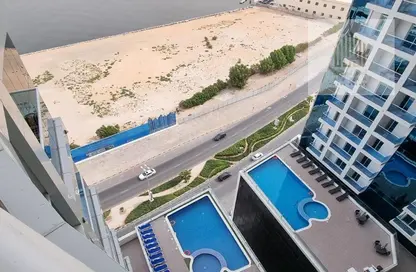 صورة لـ حوض سباحة شقة - 2 غرف نوم - 3 حمامات للبيع في برج الواحة - الراشدية 1 - الراشدية - عجمان ، صورة رقم 1