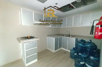 Kitchen image for: Apartment - 1 Bedroom - 2 Bathrooms for rent in Al Rashidiya 1 - Al Rashidiya - Ajman, Image 1