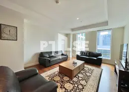 Living Room image for: Apartment - 3 Bedrooms - 4 Bathrooms for sale in Limestone House - DIFC - Dubai, Image 1