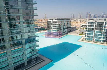 صورة لـ حوض سباحة شقة - 2 غرف نوم - 3 حمامات للايجار في مساكن 12 - المنطقة وان - مدينة الشيخ محمد بن راشد - دبي ، صورة رقم 1