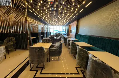Shop - Studio - 5 Bathrooms for sale in Corniche Tower - Ajman Corniche Road - Ajman