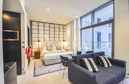Living Room image for: Apartment - 1 Bathroom for sale in Millennium Atria Business Bay - Business Bay - Dubai, Image 1