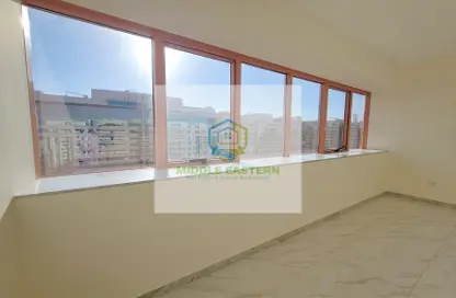 Empty Room image for: Apartment - 2 Bedrooms - 2 Bathrooms for rent in Al Wahda Street - Al Wahda - Abu Dhabi, Image 1