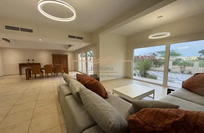 Living / Dining Room image for: Townhouse - 3 Bedrooms - 3 Bathrooms for rent in The Townhouses at Al Hamra Village - Al Hamra Village - Ras Al Khaimah, Image 1