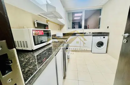 Apartment - 1 Bedroom - 2 Bathrooms for rent in Jumeirah Garden City - Al Satwa - Dubai