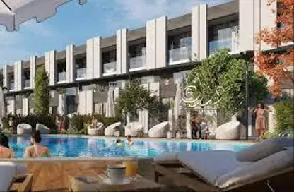 Pool image for: Villa - 4 Bedrooms - 5 Bathrooms for sale in Reportage Village 1 - Dubai Land - Dubai, Image 1