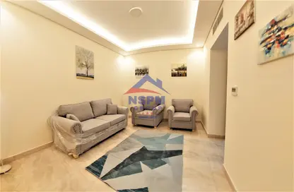 Living Room image for: Apartment - 1 Bedroom - 1 Bathroom for rent in Muroor Area - Abu Dhabi, Image 1