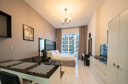 Room / Bedroom image for: Apartment - 1 Bathroom for rent in Giovanni Boutique Suites - Dubai Sports City - Dubai, Image 1
