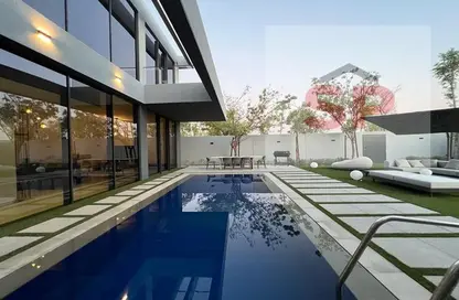 Pool image for: Villa - 6 Bedrooms for sale in Sequoia - Masaar - Tilal City - Sharjah, Image 1