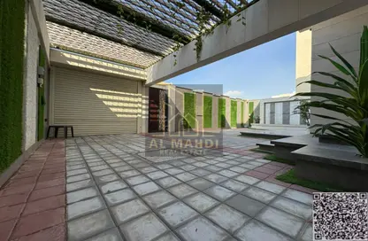 Villa - 5 Bedrooms - 7 Bathrooms for sale in Ajman Hills - Al Alia - Ajman