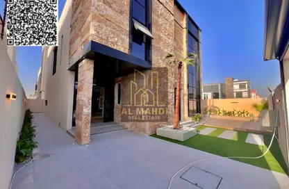 Villa - 5 Bedrooms - 7 Bathrooms for sale in Ajman Hills - Al Alia - Ajman