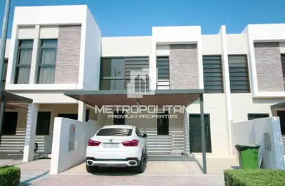 Outdoor House image for: Townhouse - 3 Bedrooms - 5 Bathrooms for sale in Aurum Villas - Claret - Damac Hills 2 - Dubai, Image 1