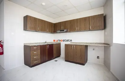 Kitchen image for: Apartment - 1 Bathroom for rent in RAK Tower - Al Seer - Ras Al Khaimah, Image 1