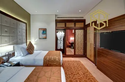 شقة - 2 غرف نوم - 3 حمامات للايجار في رويال كونتيننتال سويتس - الخليج التجاري - دبي