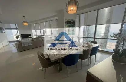 Living / Dining Room image for: Apartment - 3 Bedrooms - 4 Bathrooms for rent in Etihad Towers - Corniche Road - Abu Dhabi, Image 1