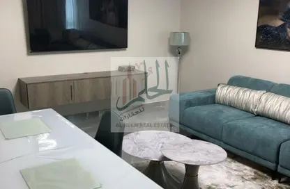شقة - غرفة نوم - 2 حمامات للبيع في أورينت تاور 1 - أورينت تاور - البستان - عجمان