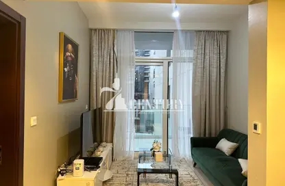 Living Room image for: Apartment - 1 Bathroom for rent in Reva Residences - Business Bay - Dubai, Image 1
