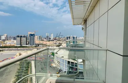 Balcony image for: Apartment - 1 Bedroom - 2 Bathrooms for sale in Stadium Point - Dubai Sports City - Dubai, Image 1