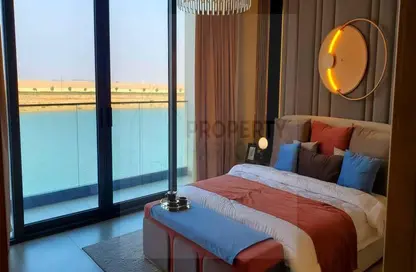 Room / Bedroom image for: Apartment - 1 Bathroom for sale in Blue Bay - Al Nujoom Islands - Sharjah, Image 1