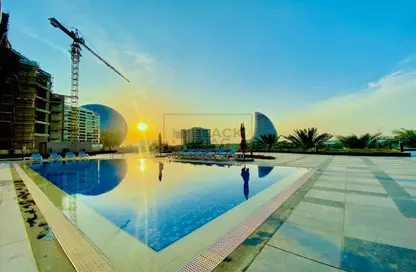 Pool image for: Apartment - 1 Bedroom - 2 Bathrooms for rent in Al Dana - Al Raha Beach - Abu Dhabi, Image 1