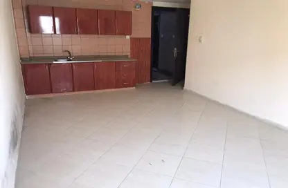 Kitchen image for: Apartment - 1 Bathroom for rent in Al Rashidiya - Ajman, Image 1