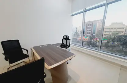 Business Centre - Studio - 4 Bathrooms for rent in Burj Nahar Building - Al Muteena - Deira - Dubai