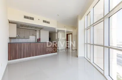 Kitchen image for: Apartment - 1 Bedroom - 2 Bathrooms for rent in Reef Residence - District 13 - Jumeirah Village Circle - Dubai, Image 1