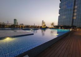 Pool image for: Apartment - 2 bedrooms - 4 bathrooms for rent in Airport Road Area - Al Garhoud - Dubai, Image 1