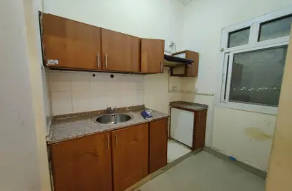 Kitchen image for: Apartment - 1 Bathroom for rent in Mohamed Bin Zayed Centre - Mohamed Bin Zayed City - Abu Dhabi, Image 1