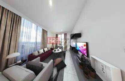 Living Room image for: Apartment - 1 Bedroom - 1 Bathroom for sale in Rukan Residences - Rukan - Dubai, Image 1