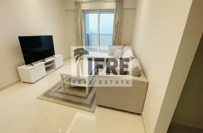 Living Room image for: Apartment - 1 Bedroom - 2 Bathrooms for rent in Hera Tower - Dubai Sports City - Dubai, Image 1