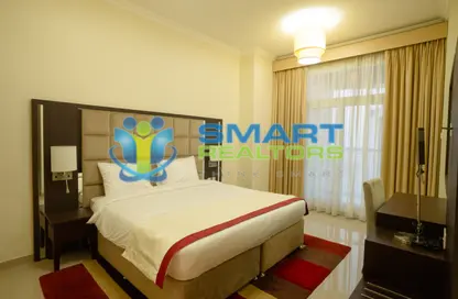 Apartment - 2 Bedrooms - 3 Bathrooms for rent in Siraj Tower - Arjan - Dubai