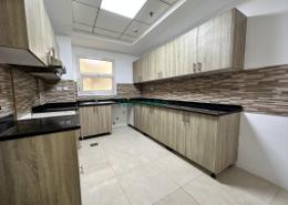 صورةمطبخ لـ: شقة - 2 غرف نوم - 3 حمامات للكراء في طلال ريزيدنس - مجمع دبي للاستثمار الثاني - مجمع دبي للإستثمار - دبي, صورة 1