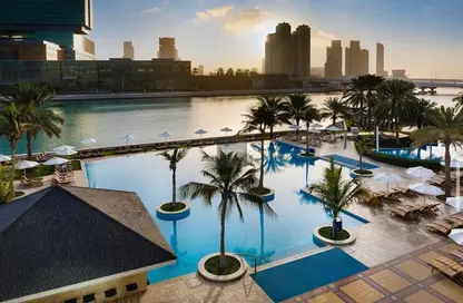 Pool image for: Apartment - 1 Bedroom - 2 Bathrooms for rent in Beach Rotana - Tourist Club Area - Abu Dhabi, Image 1